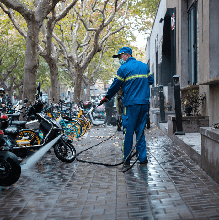 Commercial blast cleaning on a sidewalk