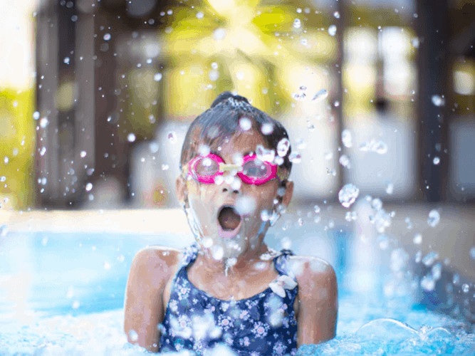 Girl playing in a pool